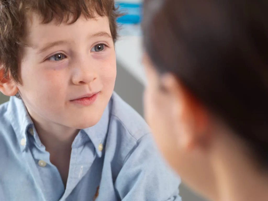 doctor comforting young boy in clinic 2024 06 10 17 16 41 utc