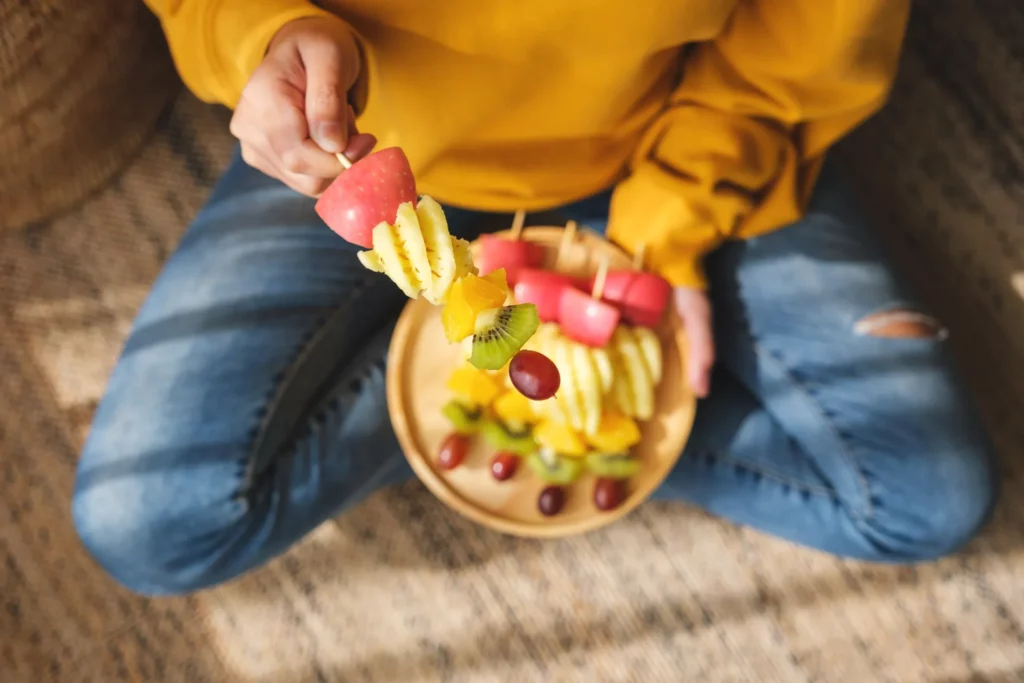 top view image of a woman holding a wooden plate o 2023 11 27 05 11 06 utc